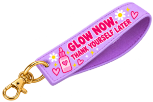 Llavero de muñeca lila GLOW NOW de SKIN IS MY RELIGION con mosquetón dorado